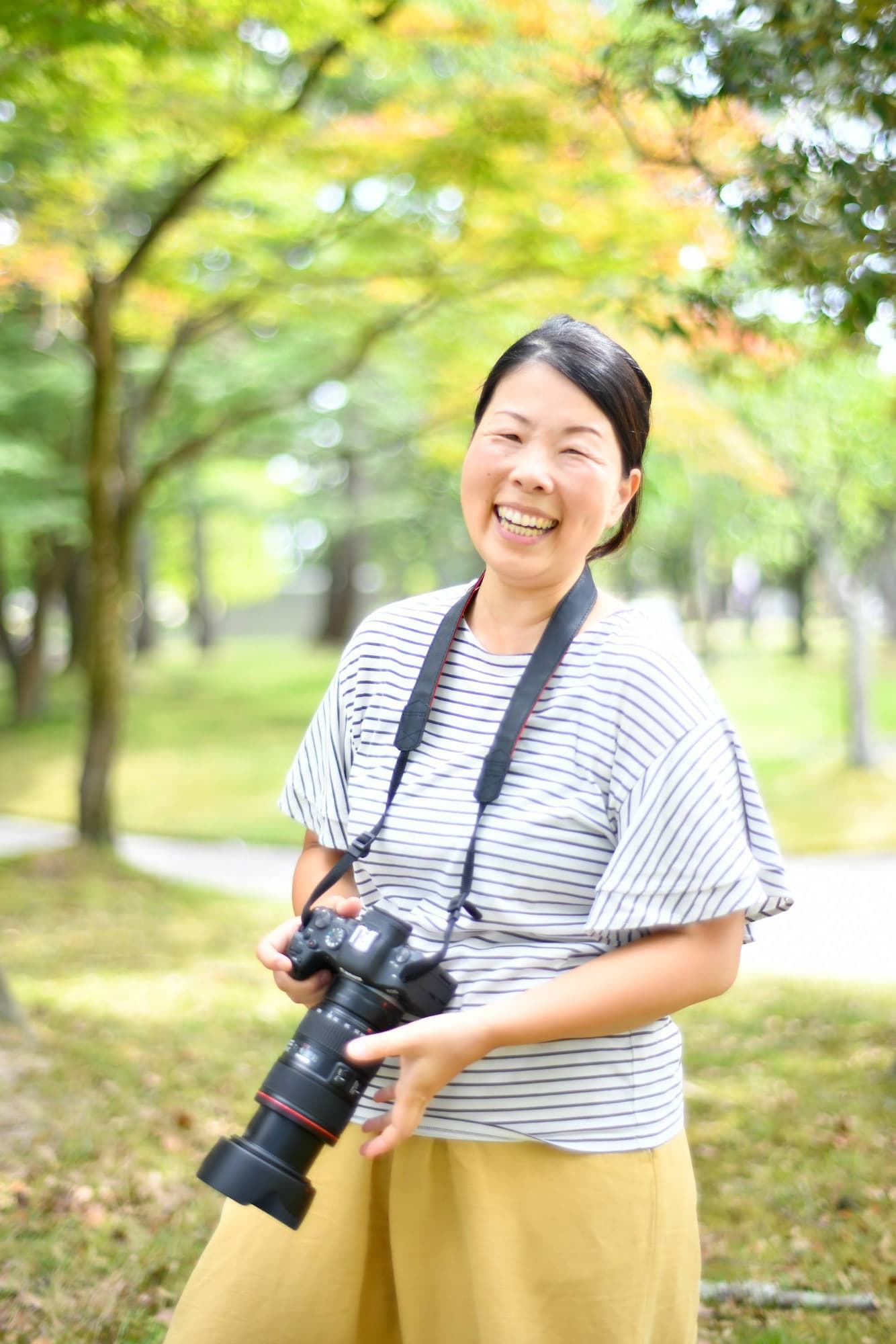 女性フォトグラファー児島